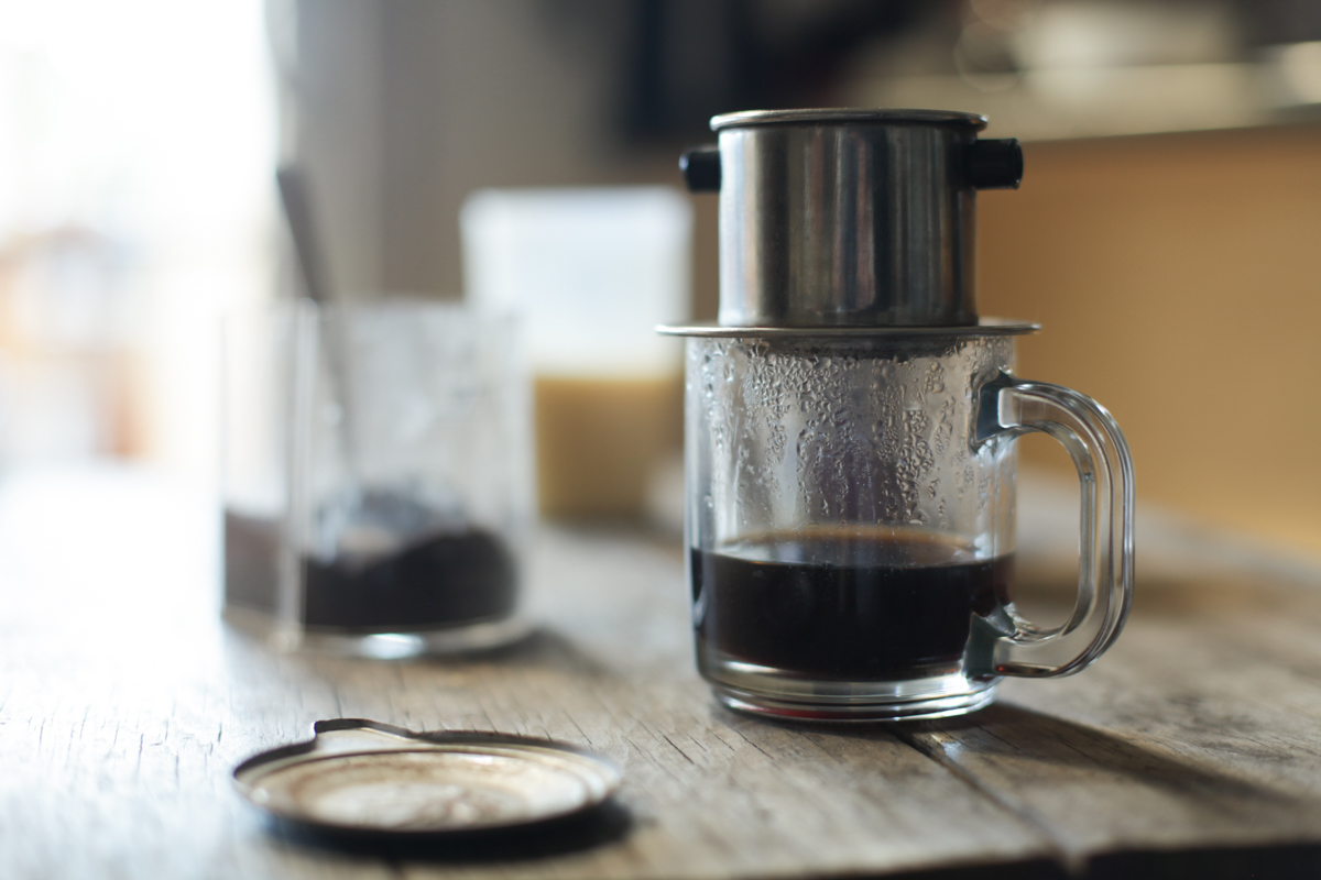 Vietnamese coffee brewing with metal filter